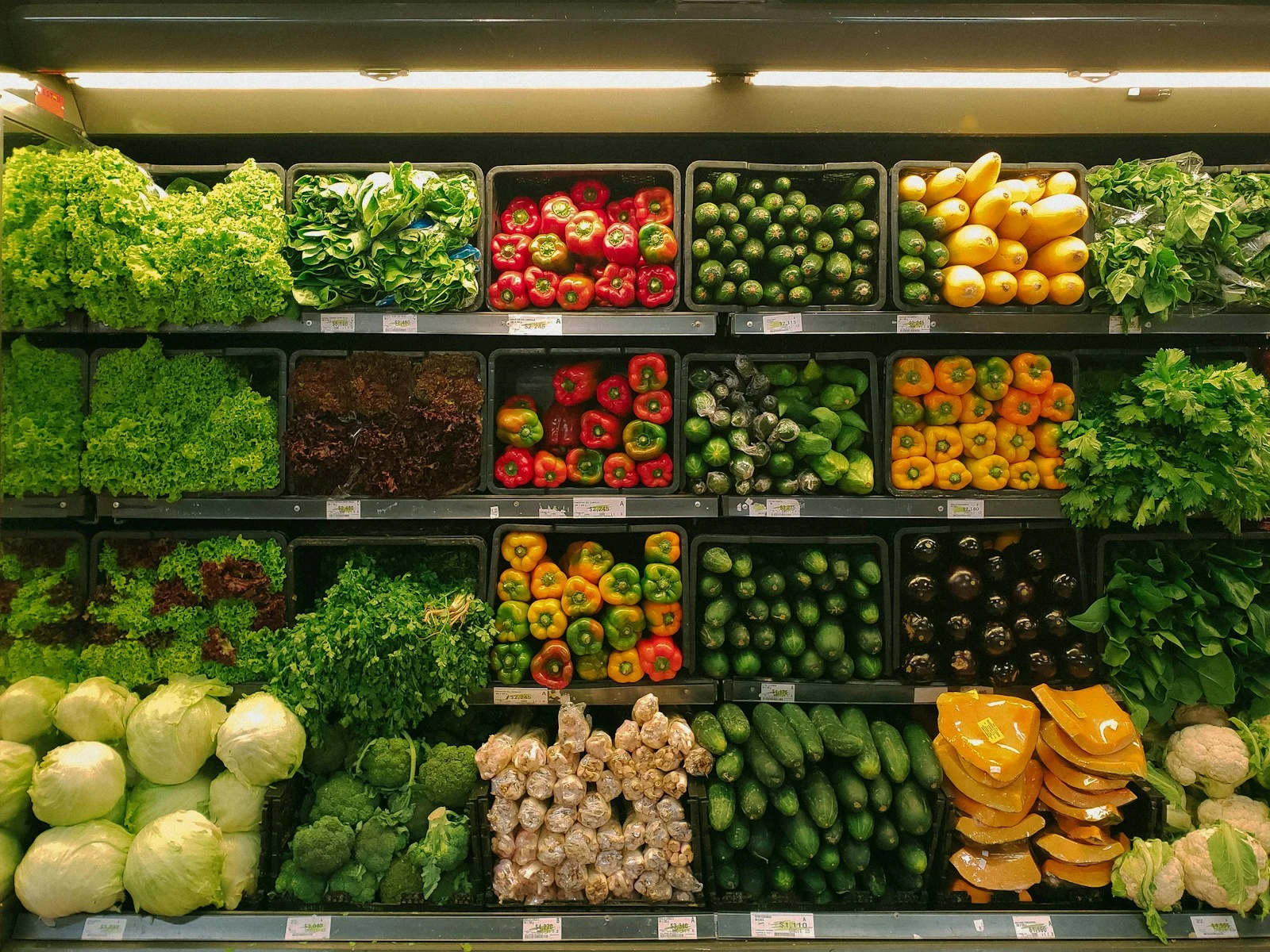 AI-generated photorealistic editorial illustration of a supermarket basket with groceries, baked beans and a jar of gherkins beside a long receipt; no brands or readable text.