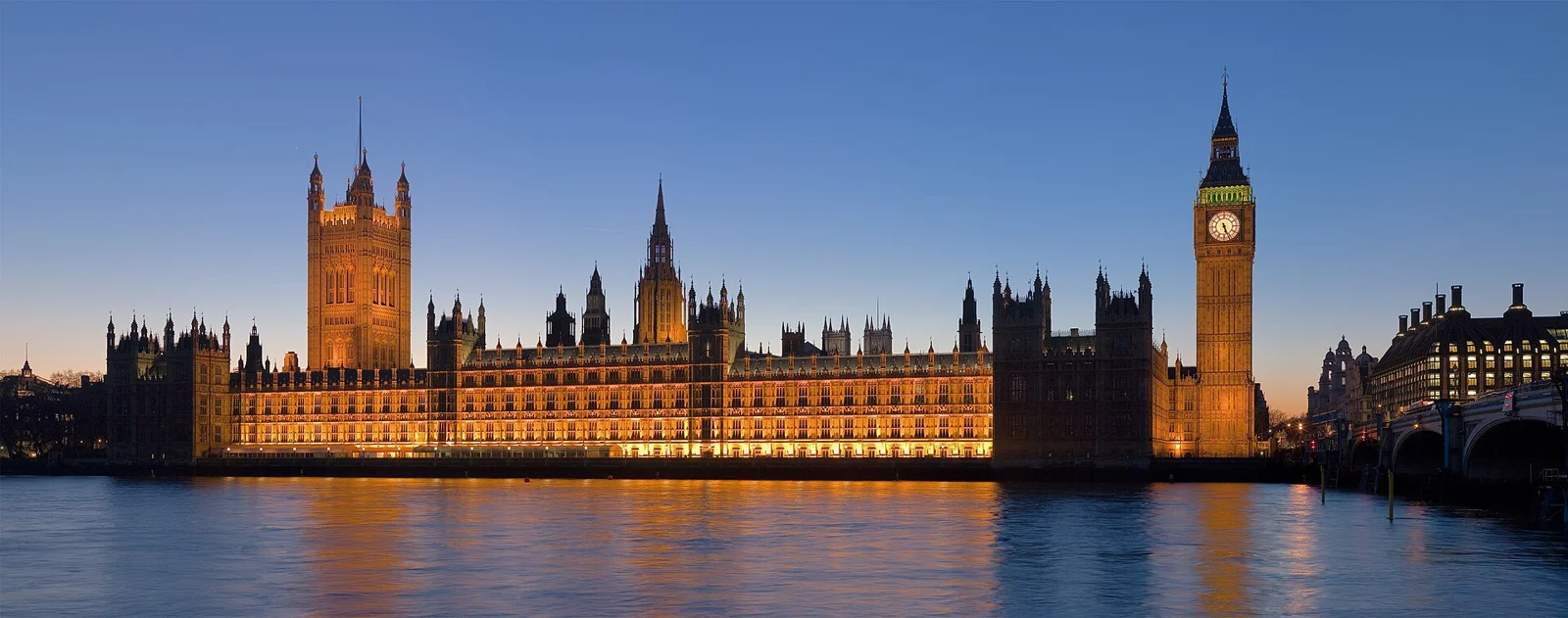 Palace of Westminster illuminated at dusk, London